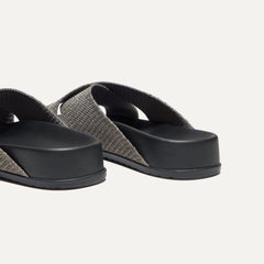"Close up of the heel of The Weekend Slide in Silver Sand.
"