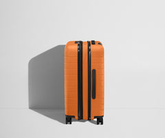 The Bigger Carry-On Flex in Sorbet Orange