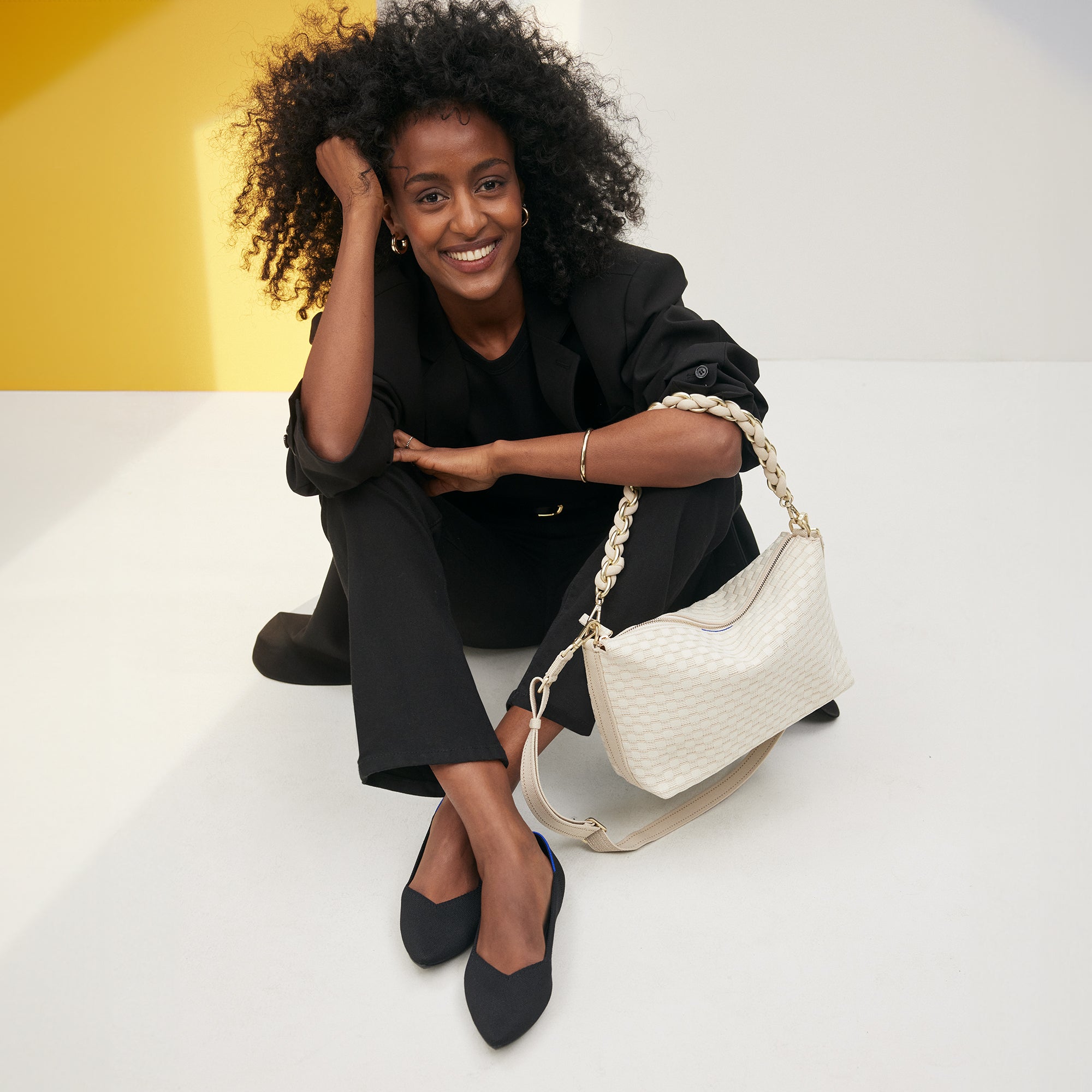 The Daily Crossbody in White Sand paired with The Shoulder Strap in White.