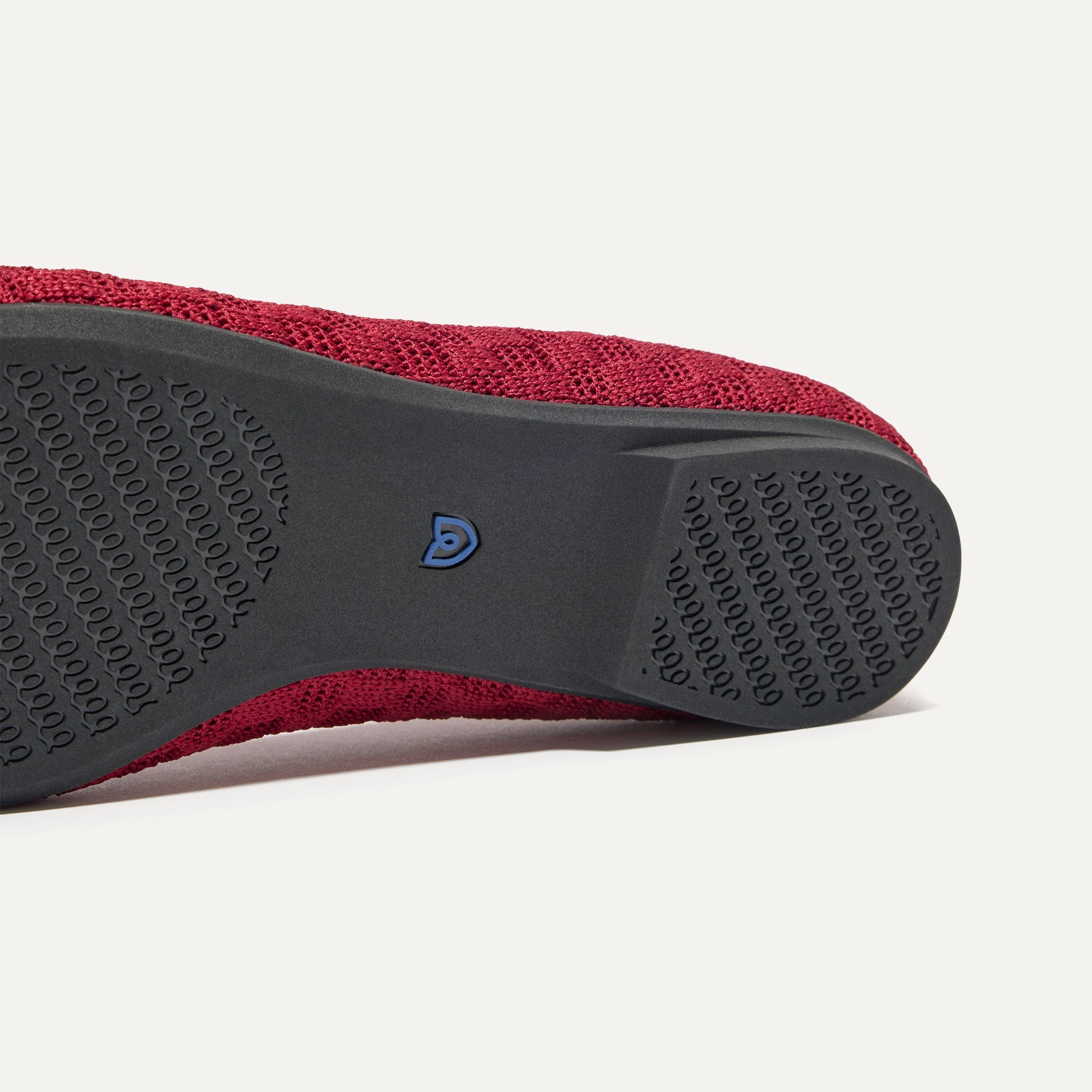 Close up of the outsole of The Max Square in Ruby.