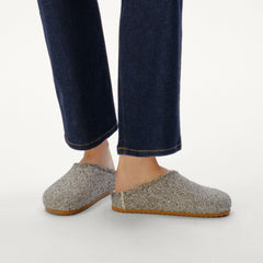hover | Model wearing The Cozy Clog in Cookies and Cream Bouclé.