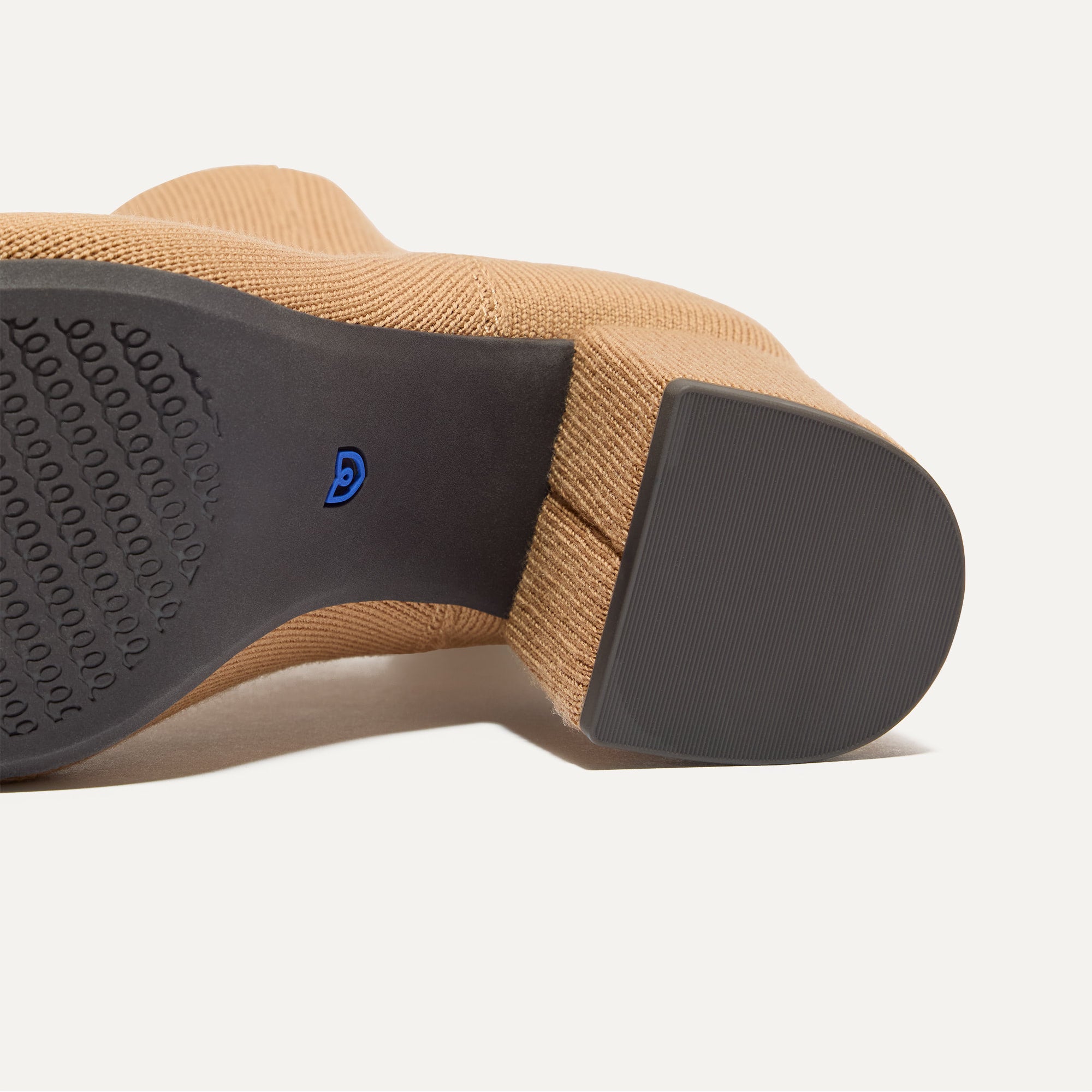 Close up of the outsoles of The High Classic Boot in Tobacco.