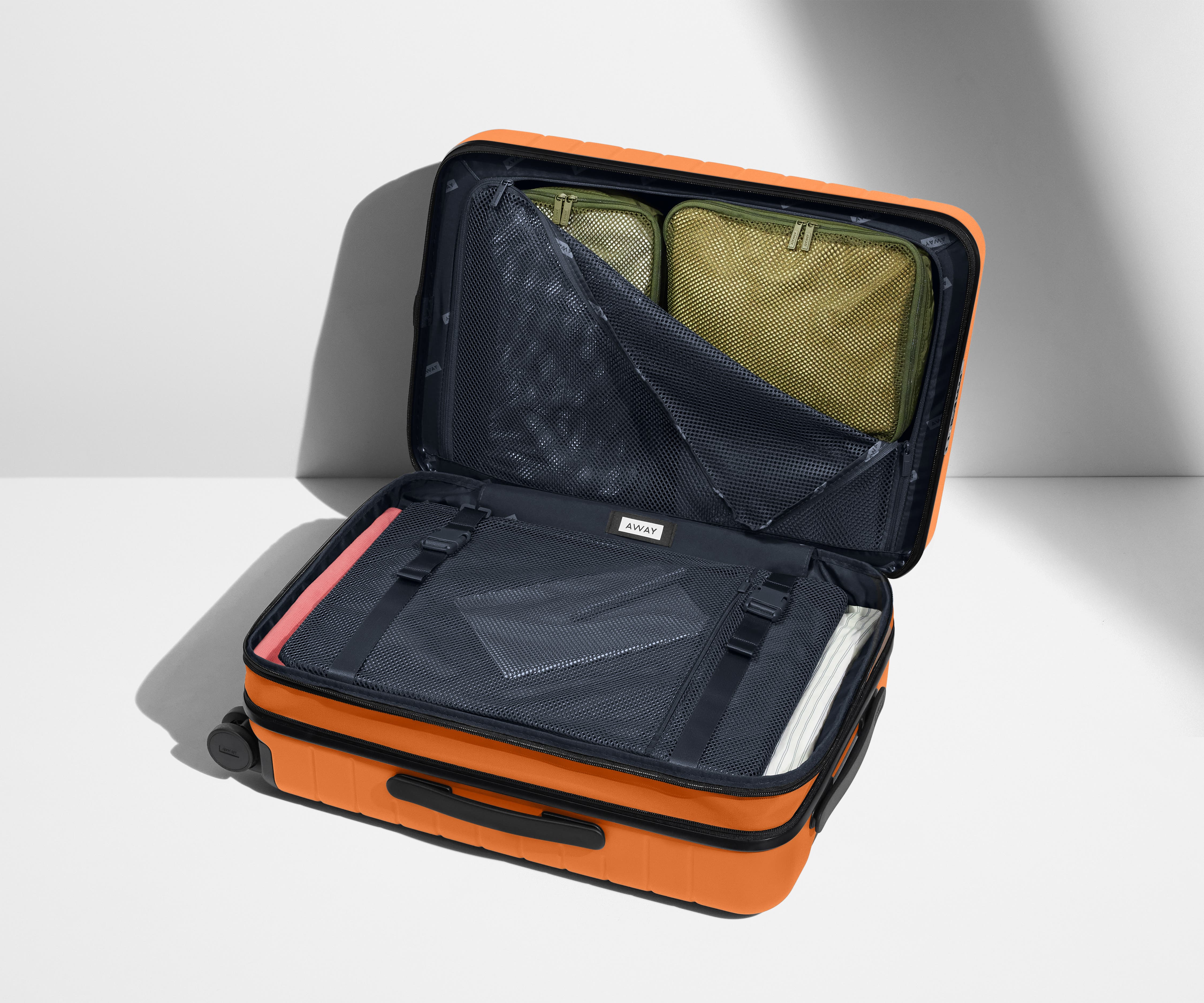 The Bigger Carry-On Flex in Sorbet Orange